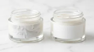 A Side By Side Comparison Of A Bubbly, Crooked Product Label Versus A Perfectly Applied Smooth Label On Premium Glass Cosmetic Jars.