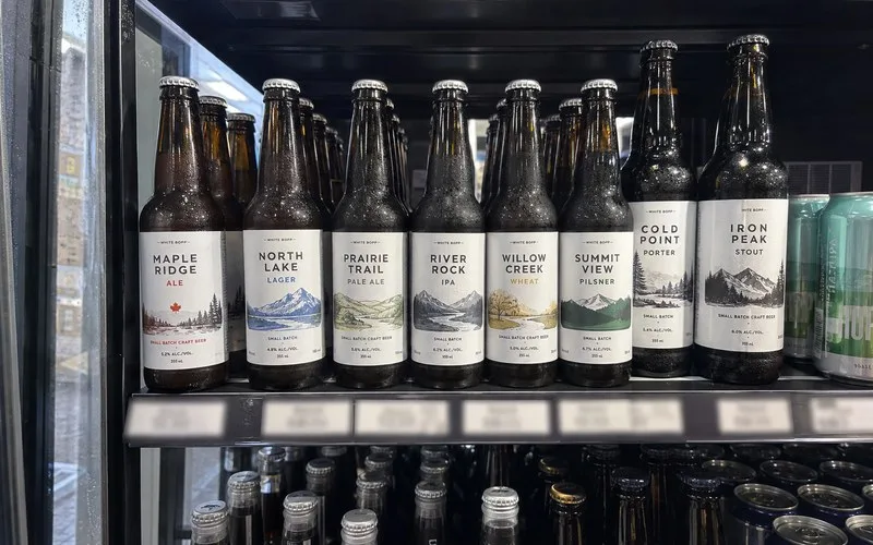 Canadian craft brewery bottles with custom labels on retail shelf