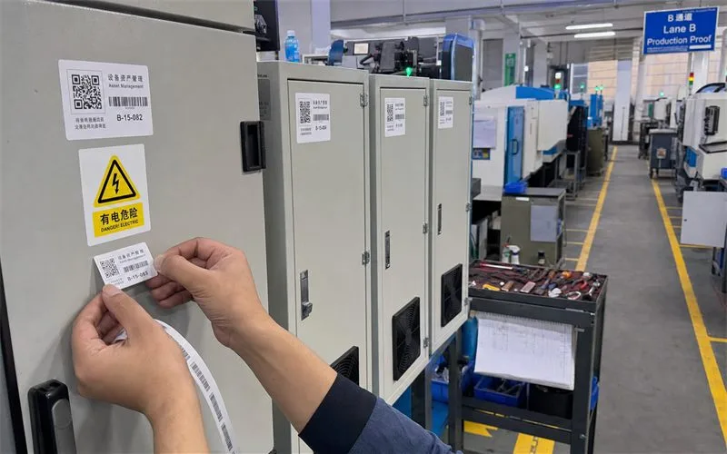 Serialized industrial roll labels on machinery panels