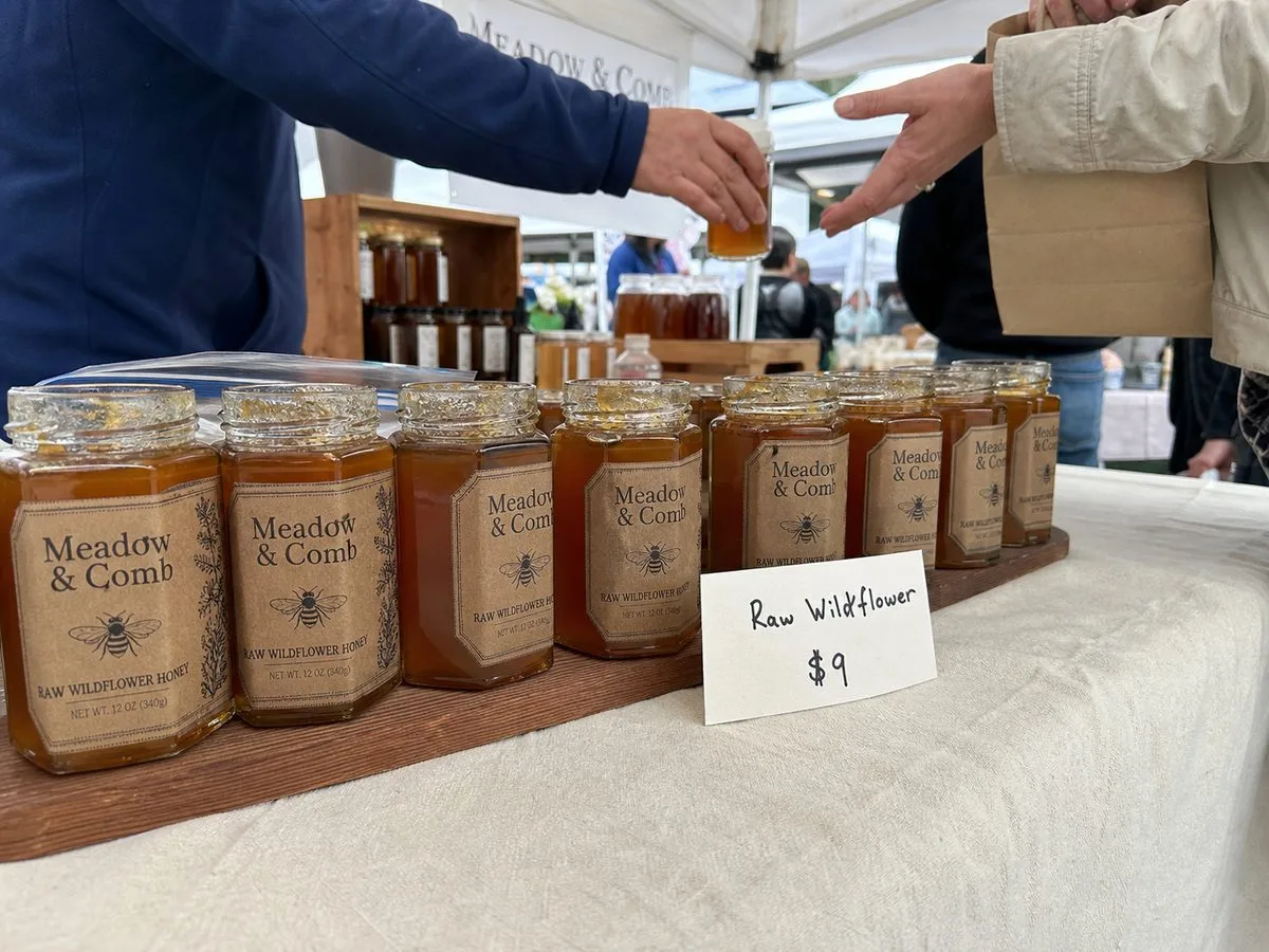 USA regional honey brand with custom labels on retail shelf