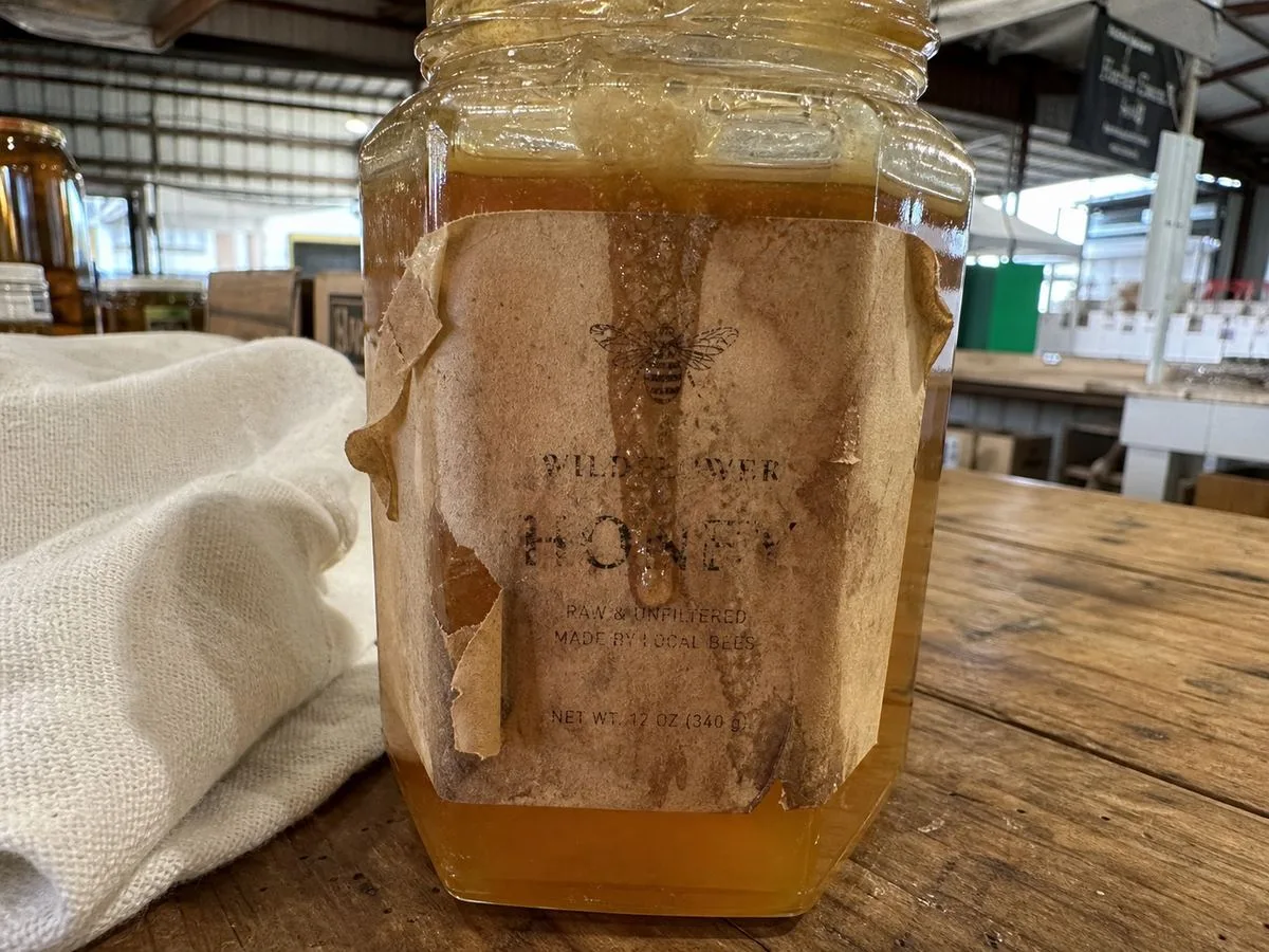 Honey drip smudging on paper label