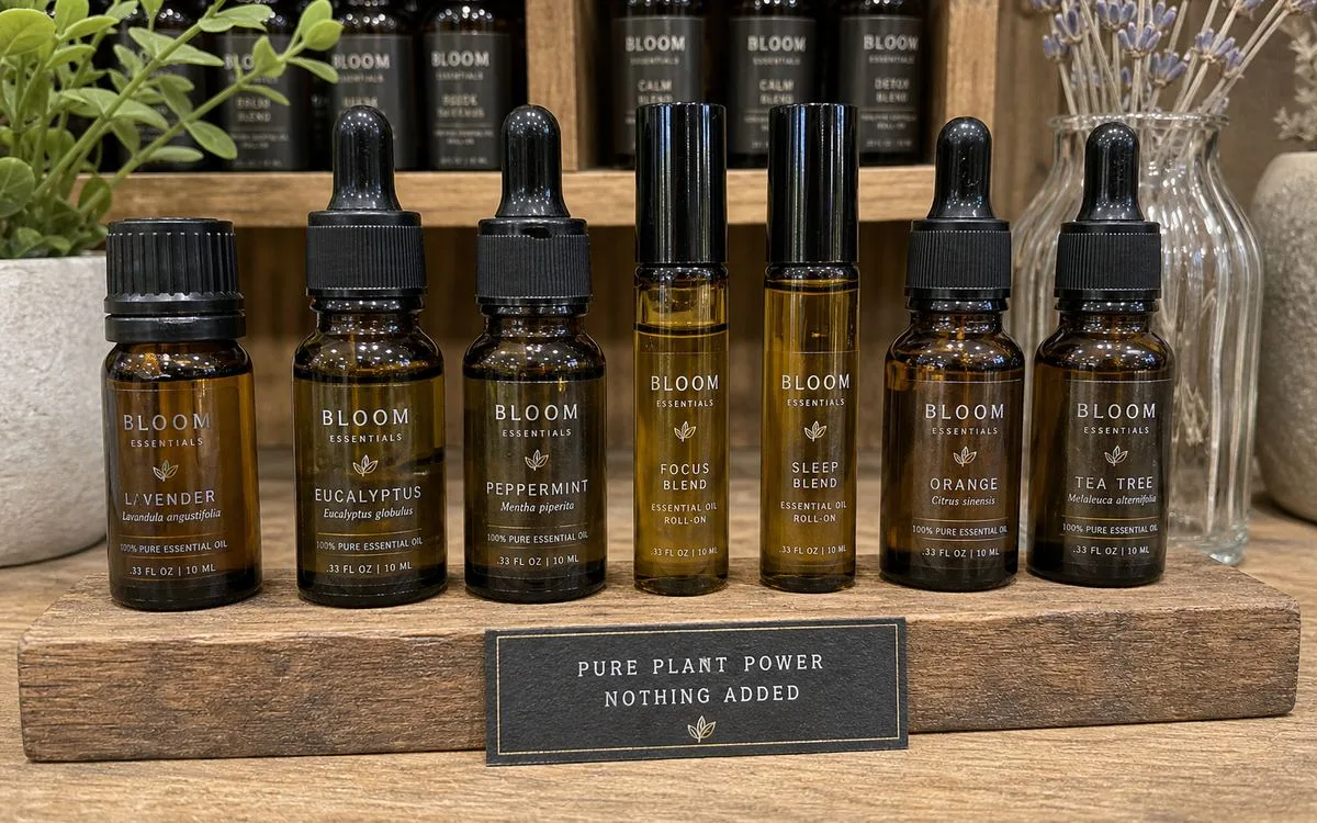 Small-format clear PET sheet labels on essential oil dropper bottles