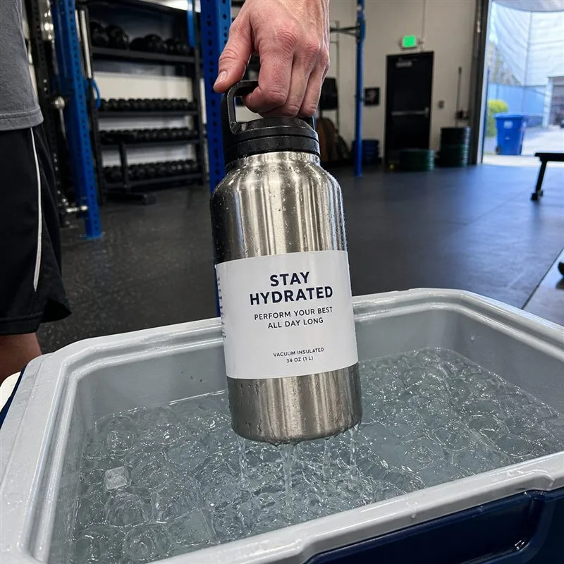 Aluminum gym water bottle with matte BOPP label pulled from ice water