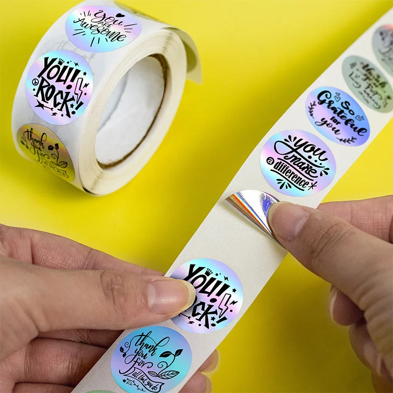 Colorful Round Labels Being Peeled From Roll