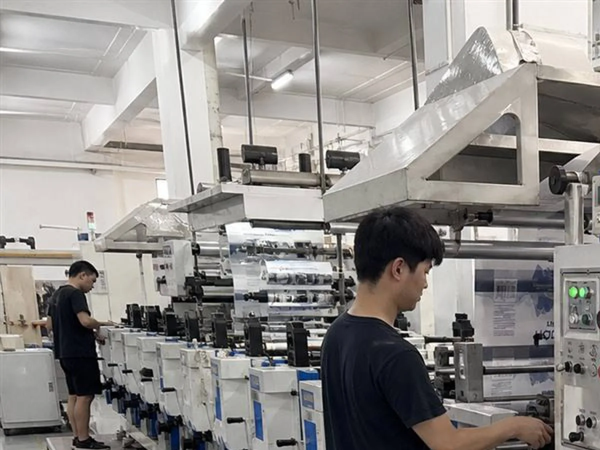 Flexographic press running large water bottle label volume