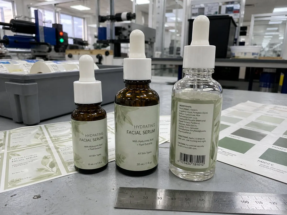Serum dropper bottles with slim wrap labels
