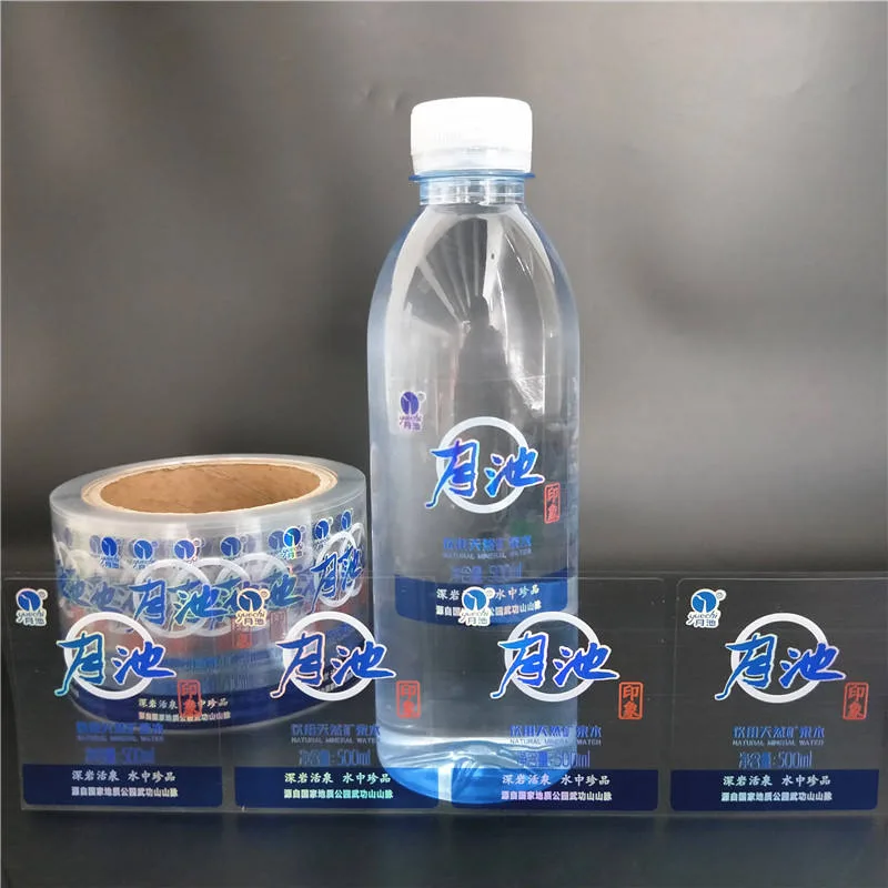 Water Bottle Labels Beside Clear Bottle