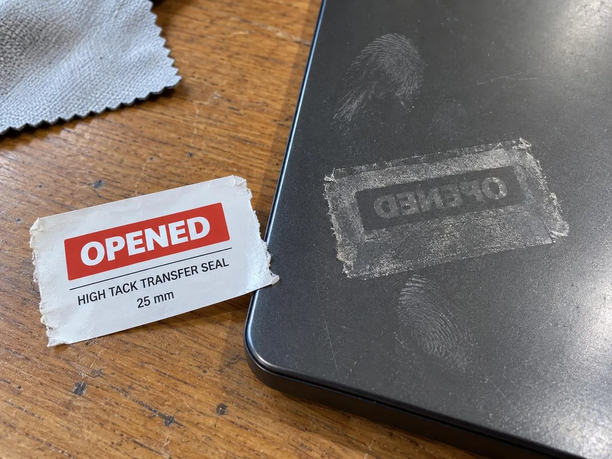 Adhesive ghost transferred onto a surface after seal removal